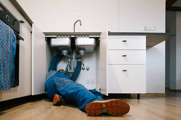Professional Drain Cleaning technician working in Russell, PA